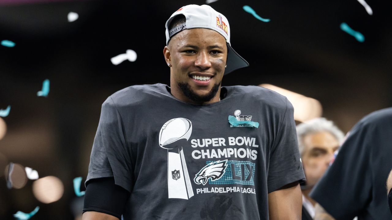 Philadelphia Eagles running back Saquon Barkley (26) celebrates after defeating the Kansas City Chiefs during Super Bowl LIX at Ceasars Superdome.
