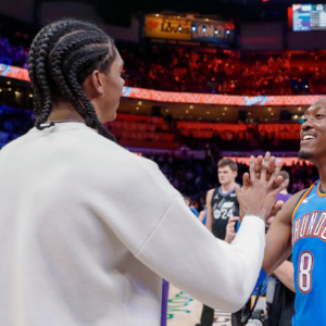 Oklahoma City Thunder forward Jalen Williams (8) meets with his brother Utah Jazz forward Cody Williams (5) after their game