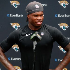 Jacksonville Jaguars wide receiver Travis Hunter (12) meets with the media following rookie minicamp at Miller Electric Center.
