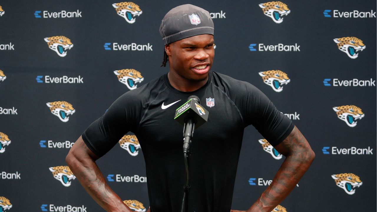 Jacksonville Jaguars wide receiver Travis Hunter (12) meets with the media following rookie minicamp at Miller Electric Center.