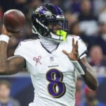 Dec 15, 2024; Houston, Texas, USA; Baltimore Ravens quarterback Lamar Jackson (8) throws the ball during the second quarter against the Houston Texans at NRG Stadium.