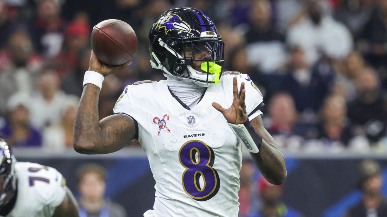 Dec 15, 2024; Houston, Texas, USA; Baltimore Ravens quarterback Lamar Jackson (8) throws the ball during the second quarter against the Houston Texans at NRG Stadium.