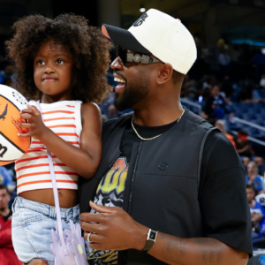 Former basketball player Dwyane Wade attends a WNBA game between the Chicago Sky and Connecticut Sun