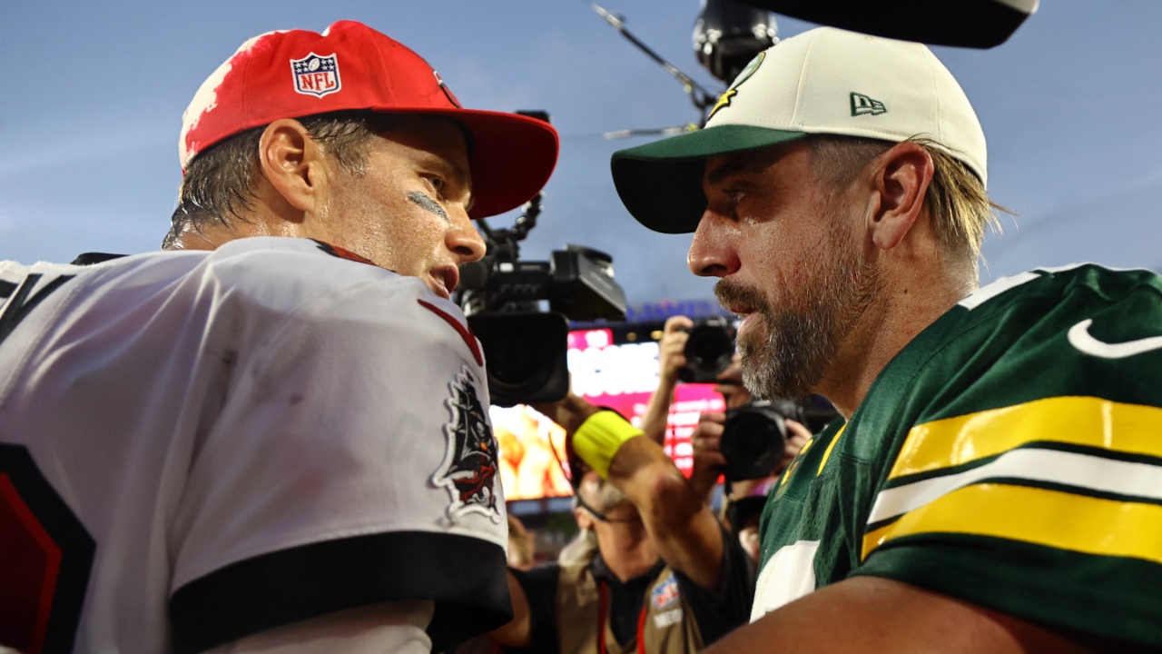 Tampa Bay Buccaneers quarterback Tom Brady (12) and Green Bay Packers quarterback Aaron Rodgers (12) greet after the game at Raymond James Stadium.