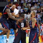 USA players Lebron James (left), Deron Williams (second left), Dwyane Wade (9), Michael Redd (second right), and Carlos Boozer celebrate after beating Spain in the mens basketball gold medal game at the Beijing Olympic Basketball Gymnasium during the 2008 Beijing Olympic Games. USA beat Spain 118-107 to win the gold medal.