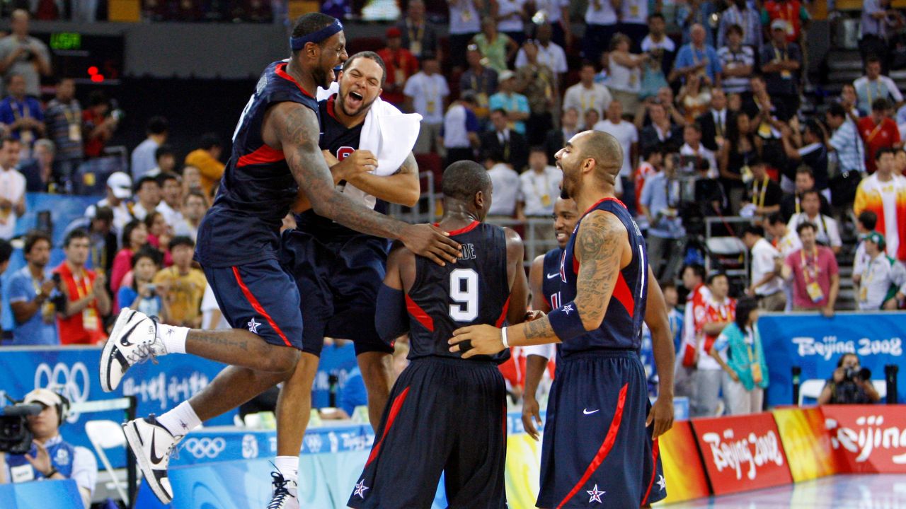 USA players Lebron James (left), Deron Williams (second left), Dwyane Wade (9), Michael Redd (second right), and Carlos Boozer celebrate after beating Spain in the mens basketball gold medal game at the Beijing Olympic Basketball Gymnasium during the 2008 Beijing Olympic Games. USA beat Spain 118-107 to win the gold medal.