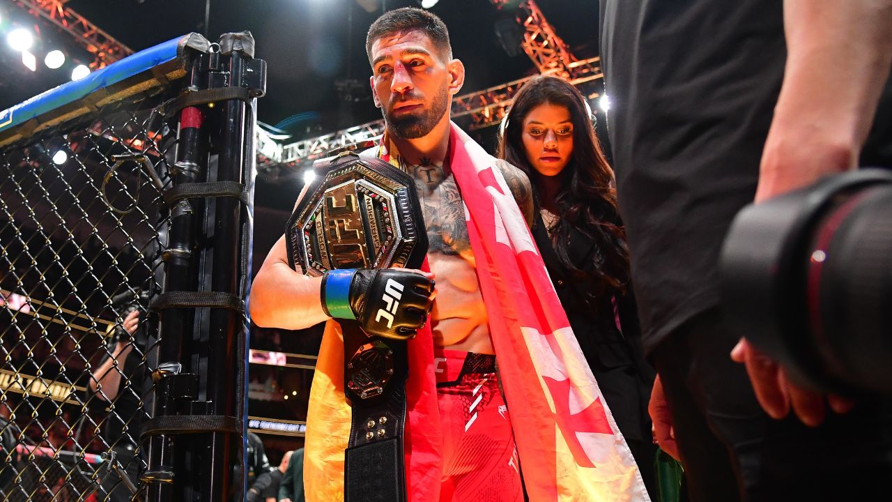 Ilia Topuria celebrates his championship victory against Alexander Volkanovski during UFC 298 at Honda Center.