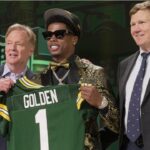 Wide receiver Matthew Golden of Texas poses with NFL Commissioner Roger Goodell and Green Bay Packers President and CEO Mark Murphy after being selected by the Green Bay Packers during the first round of the 2025 NFL Draft at Lambeau Field on April 24, 2025, in Green Bay.