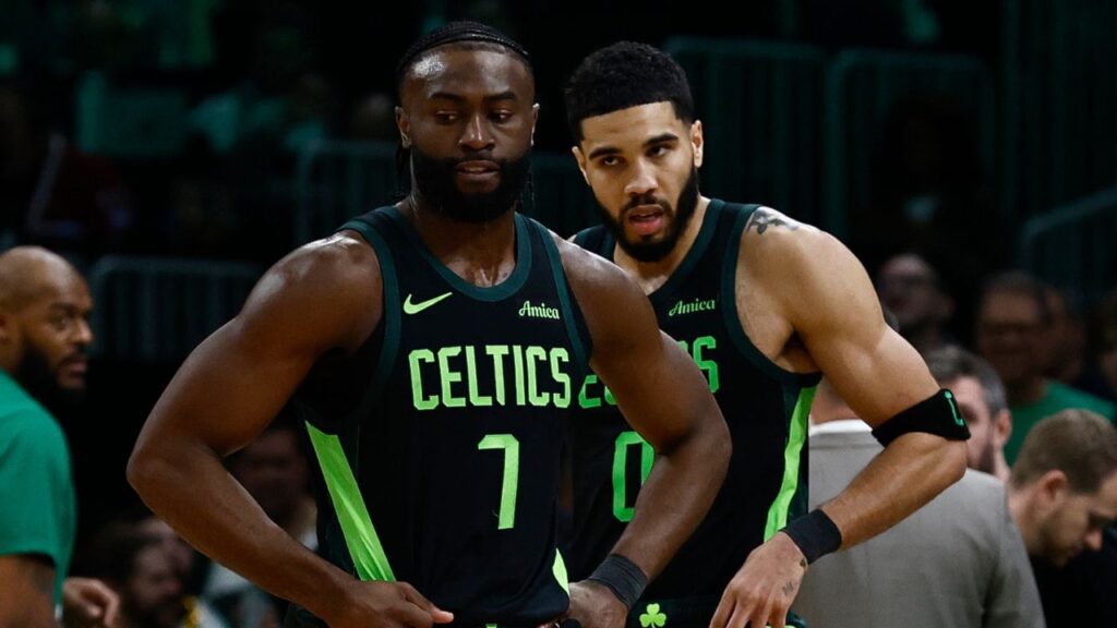 Boston Celtics guard Jaylen Brown (L) and forward Jayson Tatum (R) stand on the court during a timeout during the second half of their loss to the Cleveland Cavaliers at TD Garden.