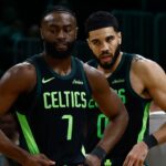 Boston Celtics guard Jaylen Brown (L) and forward Jayson Tatum (R) stand on the court during a timeout during the second half of their loss to the Cleveland Cavaliers at TD Garden.