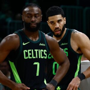 Boston Celtics guard Jaylen Brown (L) and forward Jayson Tatum (R) stand on the court during a timeout during the second half of their loss to the Cleveland Cavaliers at TD Garden.