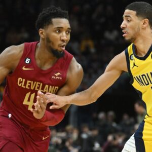 Indiana Pacers guard Tyrese Haliburton (0) defends against Cleveland Cavaliers guard Donovan Mitchell (45) during the second half at Rocket Mortgage FieldHouse.