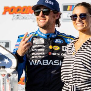 Team Penske's Ryan Blaney (12) poses with his fiancé Gianna Tulio on July 14, 2024