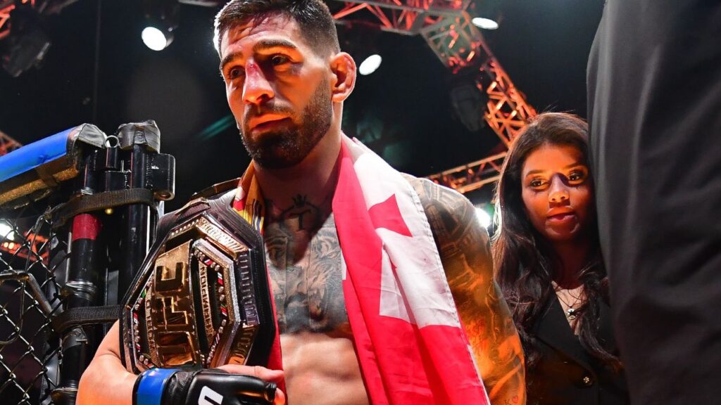Ilia Topuria celebrates his championship victory against Alexander Volkanovski during UFC 298 at Honda Center.