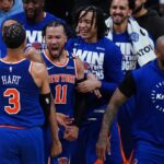 New York Knicks guard Jalen Brunson (11) reacts with teammates after defeating the Boston Celtics in overtime during game one of the second round for the 2025 NBA Playoffs at TD Garden.