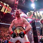 Merab Dvalishvili (red gloves) celebrates after winning a UFC bantamweight title fight against Umar Nurmagomedov (not pictured) during UFC 311 at Intuit Dome.