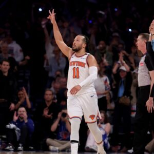 May 16, 2025; New York, New York, USA; New York Knicks guard Jalen Brunson (11) celebrates his three point shot against the Boston Celtics during the fourth quarter of game six in the second round of the 2025 NBA Playoffs at Madison Square Garden. Mandatory Credit: Brad Penner-Imagn Images