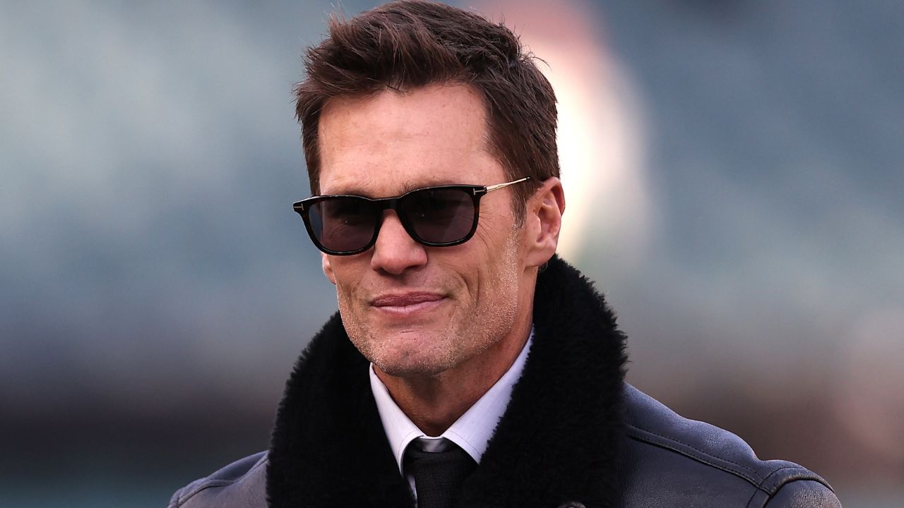 Announcer Tom Brady looks on before an NFC wild card game between the Philadelphia Eagles and the Green Bay Packers at Lincoln Financial Field.