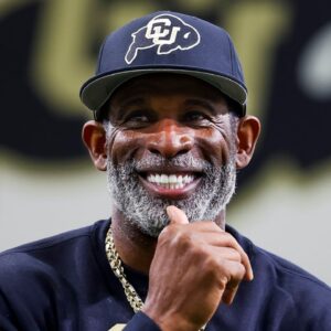 Colorado Buffaloes head coach Deion Sanders watches as his players go through drills at the University of Colorado NFL Showcase at the CU Indoor Practice Facility.
