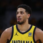 May 27, 2025; Indianapolis, Indiana, USA; Indiana Pacers guard Tyrese Haliburton (0) stands on court during the second quarter against the New York Knicks of game four of the eastern conference finals for the 2025 NBA Playoffs at Gainbridge Fieldhouse