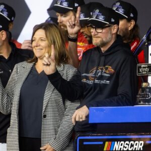 NASCAR Xfinity Series team owner Dale Earnhardt Jr and sister Kelley Earnhardt Miller celebrate after winning the 2024 Xfinity Series championship during the Championship race at Phoenix Raceway.