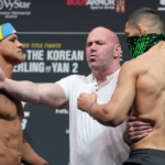 Apr 8, 2022; Jacksonville, FL, USA; Dana White (center) has to intervene between Gilbert Burns and Khamzat Chimaev during weigh ins for UFC 273 at VyStar Veterans Memorial Stadium.