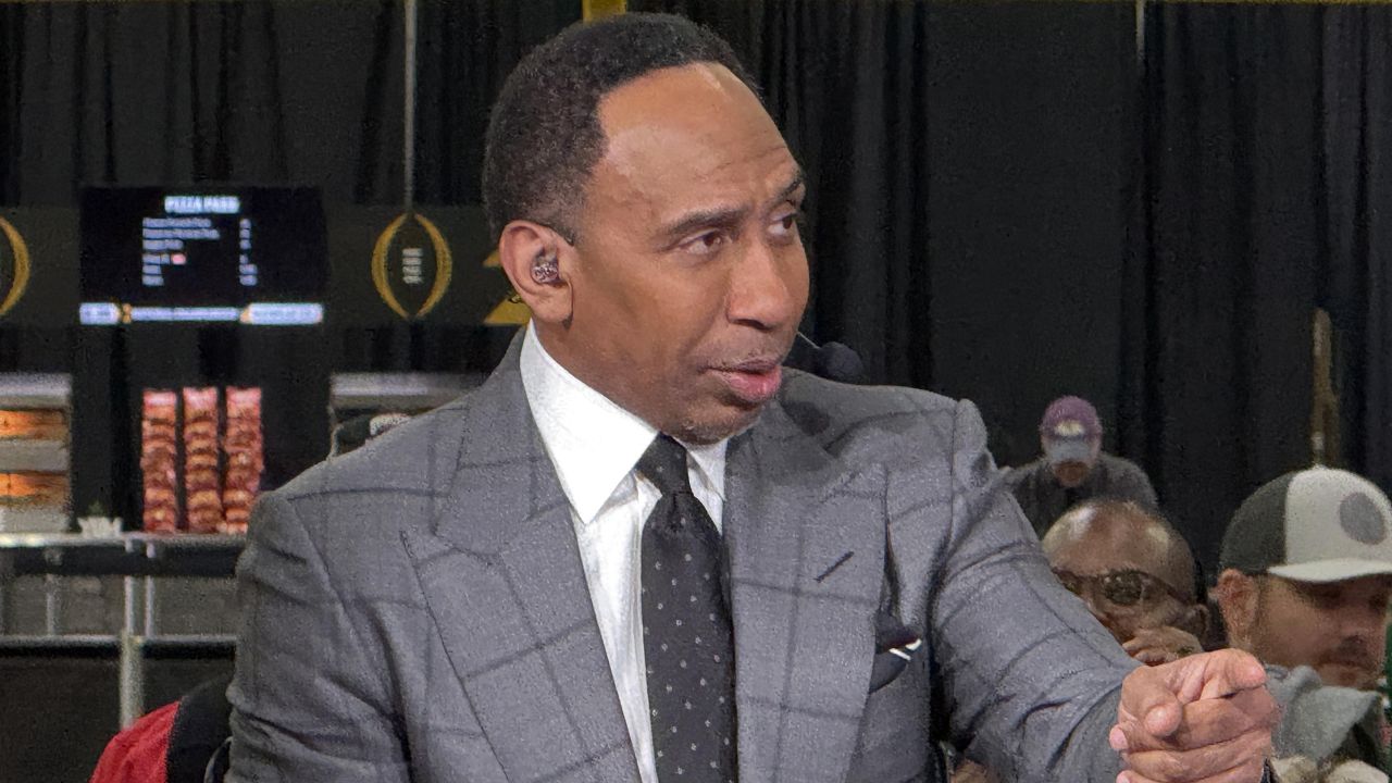 ESPN personality Stephen A. Smith on the ESPN First Take set at the CFP Fan Central at the George World Congress Center