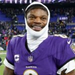 Baltimore Ravens quarterback Lamar Jackson (8) celebrates after defeating the Pittsburgh Steelers in an AFC wild card game at M&T Bank Stadium.