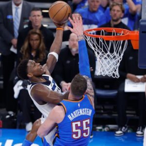 May 22, 2025; Oklahoma City, Oklahoma, USA; Minnesota Timberwolves guard Anthony Edwards (5) shoots against Oklahoma City Thunder center Isaiah Hartenstein (55) in the second quarter during game two of the western conference finals for the 2025 NBA Playoffs at Paycom Center. Mandatory Credit: Alonzo Adams-Imagn Images