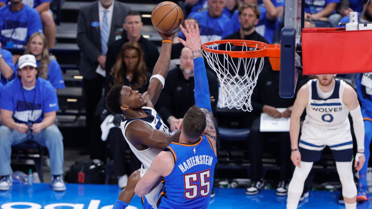 May 22, 2025; Oklahoma City, Oklahoma, USA; Minnesota Timberwolves guard Anthony Edwards (5) shoots against Oklahoma City Thunder center Isaiah Hartenstein (55) in the second quarter during game two of the western conference finals for the 2025 NBA Playoffs at Paycom Center. Mandatory Credit: Alonzo Adams-Imagn Images