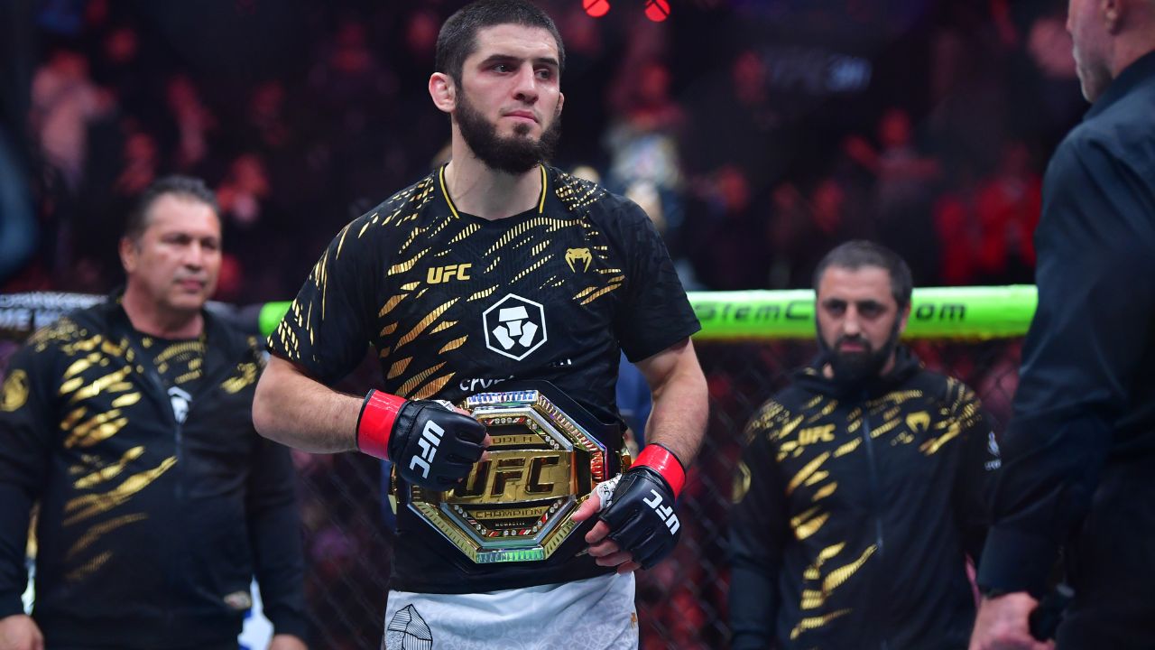; Islam Makhachev (red gloves) reacts after defeating Renato Moicano (not pictured) in a lightweight title fight during UFC 311 at Intuit Dome.