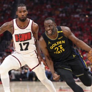 Golden State Warriors forward Draymond Green (23) drives with the ball past Houston Rockets forward Tari Eason (17) to score a basket during the second quarter of game seven of first round for the 2025 NBA Playoffs at Toyota Center