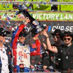 NASCAR Cup Series driver Joey Logano (22) celebrates in victory lane with the winner’s trophy after he wins the Wurth 400 race at Texas Motor Speedway.