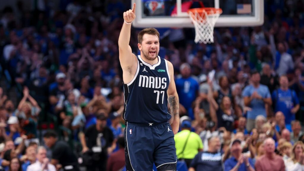 Dallas Mavericks guard Luka Doncic (77) reacts during the first quarter against the Memphis Grizzlies at American Airlines Center.