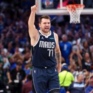 Dallas Mavericks guard Luka Doncic (77) reacts during the first quarter against the Memphis Grizzlies at American Airlines Center.