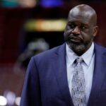 Shaquille O'Neal looks on before game four between the Miami Heat and the Boston Celtics in the Eastern Conference Finals for the 2023 NBA playoffs at Kaseya Center
