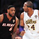 Los Angeles Lakers shooting guard Kobe Bryant (24) controls the ball against the defense of Miami Heat small forward LeBron James (6) during the first half at Staples Center