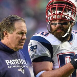 New England Patriots head coach Bill Belichick (left) and defensive end Rob Ninkovich (50) talk before Super Bowl XLIX against the Seattle Seahawks at University of Phoenix Stadium. The Patriots defeated the Seahawks 28-24.