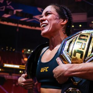 Amanda Nunes celebrates her victory by decision against Irene Aldana following UFC 289 at Rogers Arena.