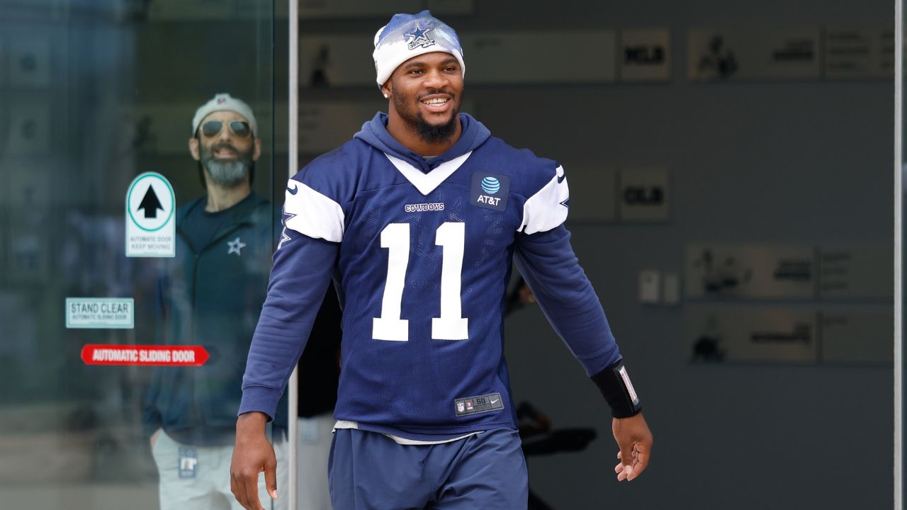 Cowboys defensive end Micah Parsons (11) walks onto the practice field at the Ford Center at the Star Training Facility in Frisco, Texas.