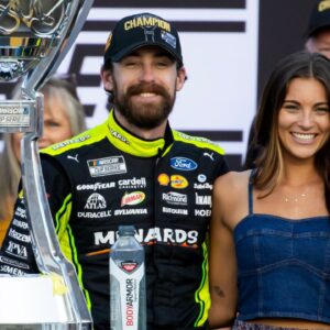 NASCAR Cup Series driver Ryan Blaney (12) celebrates with girlfriend Gianna Tulio after winning the 2023 NASCAR Cup Series Championship at Phoenix Raceway.