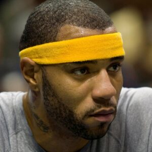 Nov 11, 2009; Milwaukee, WI, USA; Denver Nuggets forward Kenyon Martin (4) looks on from the bench during the game against the Milwaukee Bucks at the Bradley Center. The Bucks defeated the Nuggets 108-102.