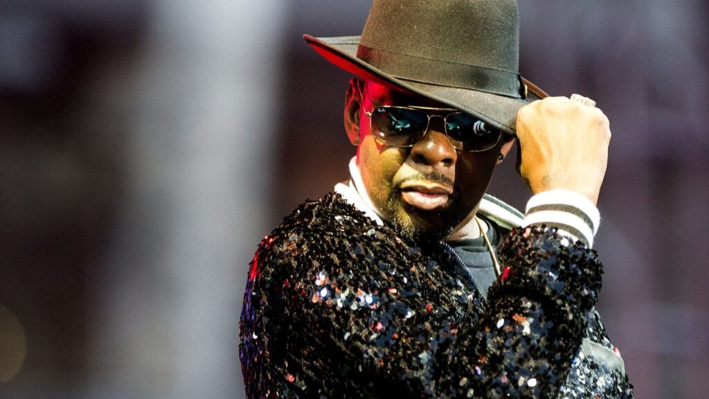 Bobby Brown tips his hat as he performs with RBRM during the Cincinnati Music Festival Friday July 27, 2019 at Paul Brown Stadium. RBRM is the R&B supergroup featuring New Edition members Brown, Ronnie DeVoe, Ricky Bell, and Michael Bivins.Cincinnati Music Festival Friday July 27, 2019 at Paul Brown Stadium. Friday Cmf22