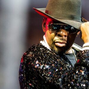 Bobby Brown tips his hat as he performs with RBRM during the Cincinnati Music Festival Friday July 27, 2019 at Paul Brown Stadium. RBRM is the R&B supergroup featuring New Edition members Brown, Ronnie DeVoe, Ricky Bell, and Michael Bivins.Cincinnati Music Festival Friday July 27, 2019 at Paul Brown Stadium. Friday Cmf22