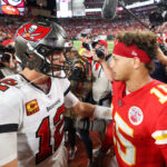 Tampa Bay Buccaneers quarterback Tom Brady (12) greets Kansas City Chiefs quarterback Patrick Mahomes (15) after a game at Raymond James Stadium.