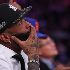 NFL wide receiver Odell Beckham Jr. sits courtside during the second half of the NBA game between the New York Knicks and the Phoenix Suns at Madison Square Garden.