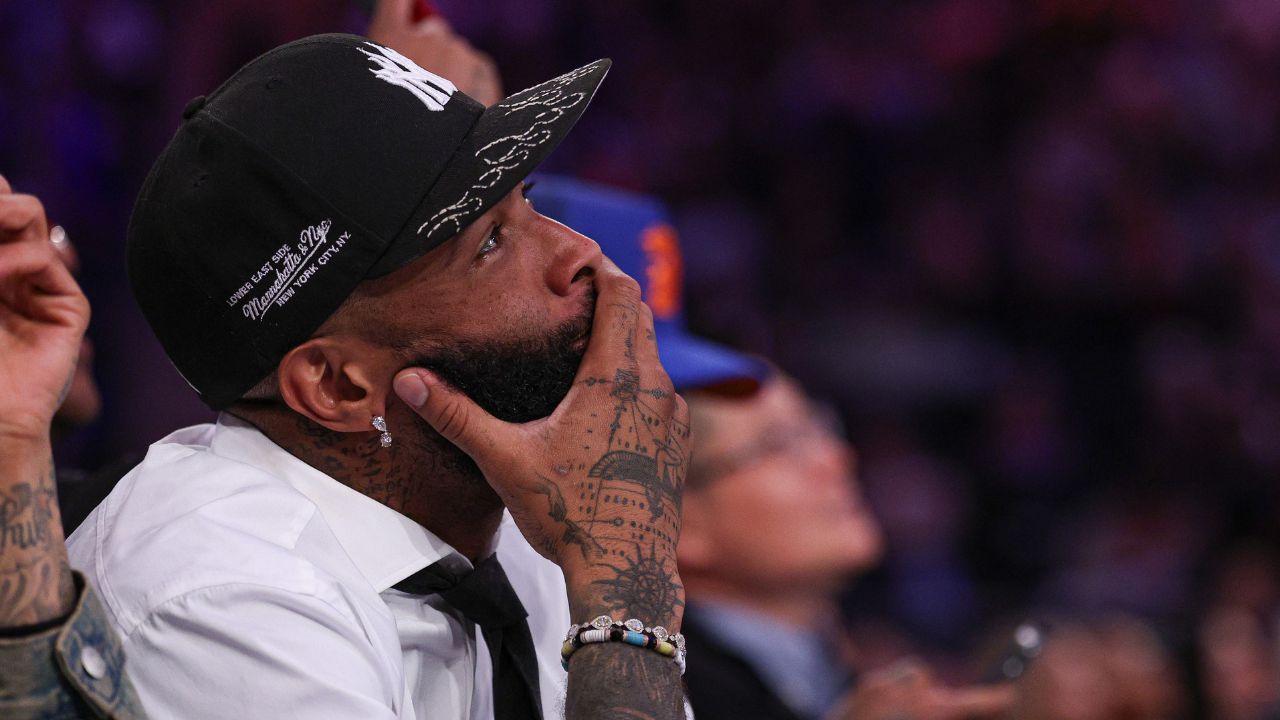 NFL wide receiver Odell Beckham Jr. sits courtside during the second half of the NBA game between the New York Knicks and the Phoenix Suns at Madison Square Garden.