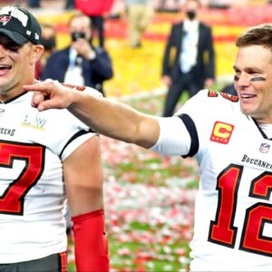 Tampa Bay Buccaneers quarterback Tom Brady (12) and tight end Rob Gronkowski (87) celebrate after beating the Kansas City Chiefs in Super Bowl LV at Raymond James Stadium.