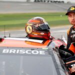 NASCAR Cup Series driver Chase Briscoe (19) prepares to get in the car after a rain delay for the Daytona 500 at Daytona International Speedway.