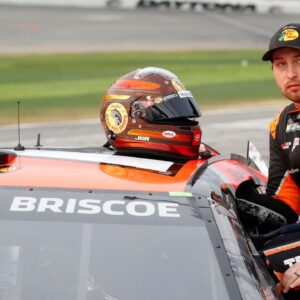 NASCAR Cup Series driver Chase Briscoe (19) prepares to get in the car after a rain delay for the Daytona 500 at Daytona International Speedway.